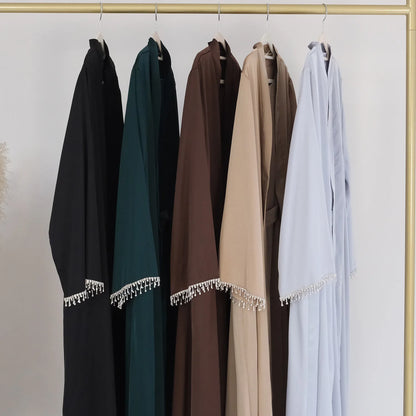 Abaya met Kralenmanchetten